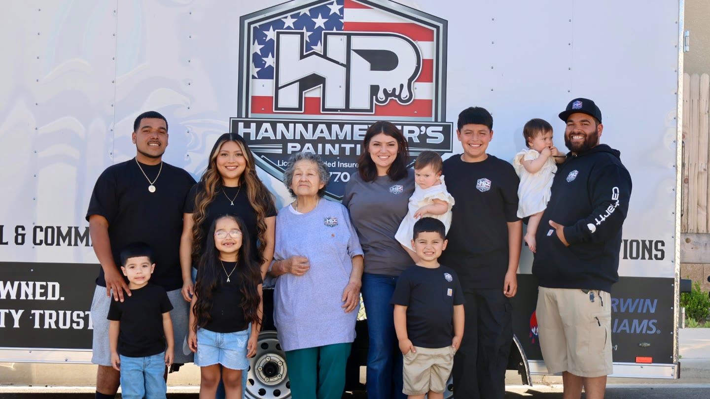 The Hannameyer family in front of the company trailer